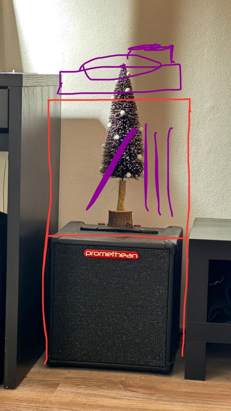 A sketch drawn over a photo of my wall: a speaker at the bottom, records in the middle, a turntable on top.