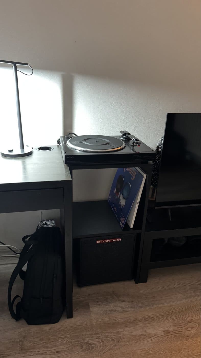 The finished unit in place: speaker underneath, records in the middle, turntable on top.